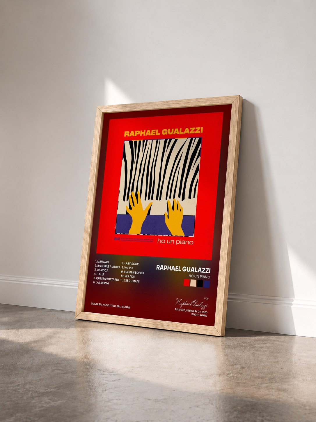 #bois Tableau de l'album Ho Un Piano de Raphael Gualazzi vu de trois quarts, cadre en bois brut