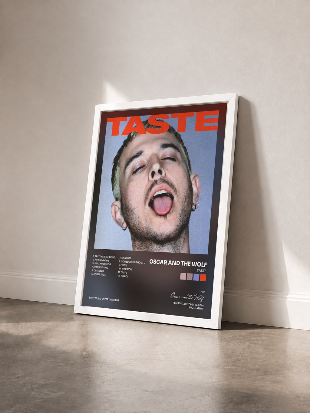 #blanc Tableau de l'album TASTE de Oscar and the Wolf vu de trois quarts, cadre blanc