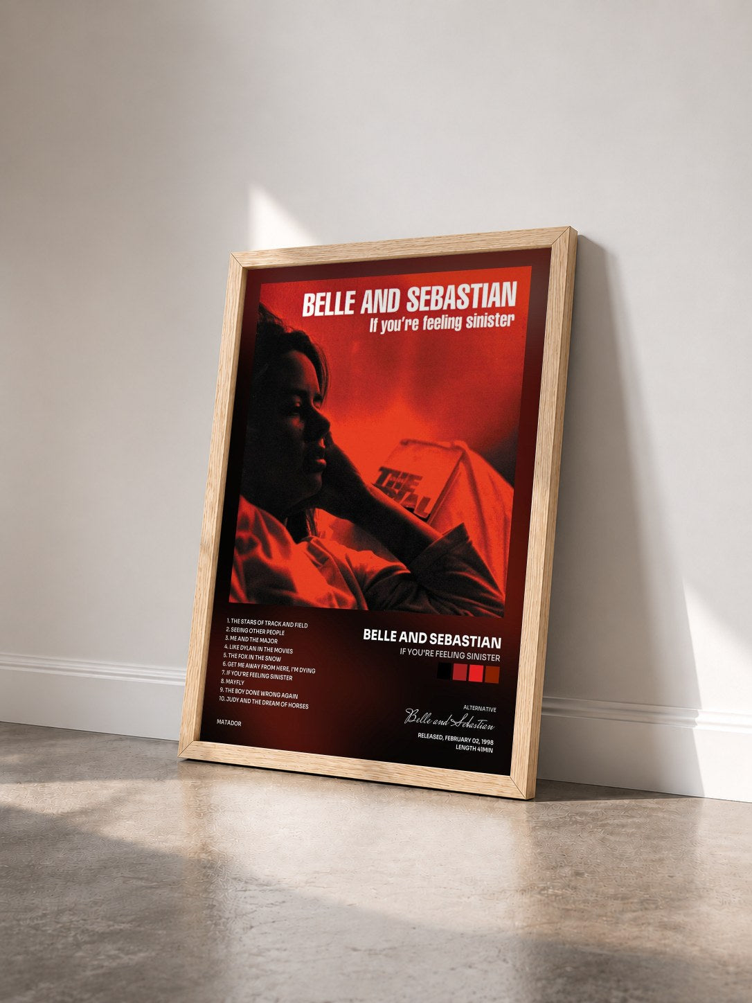 #bois Tableau de l'album If You're Feeling Sinister de Belle and Sebastian vu de trois quarts, cadre en bois brut