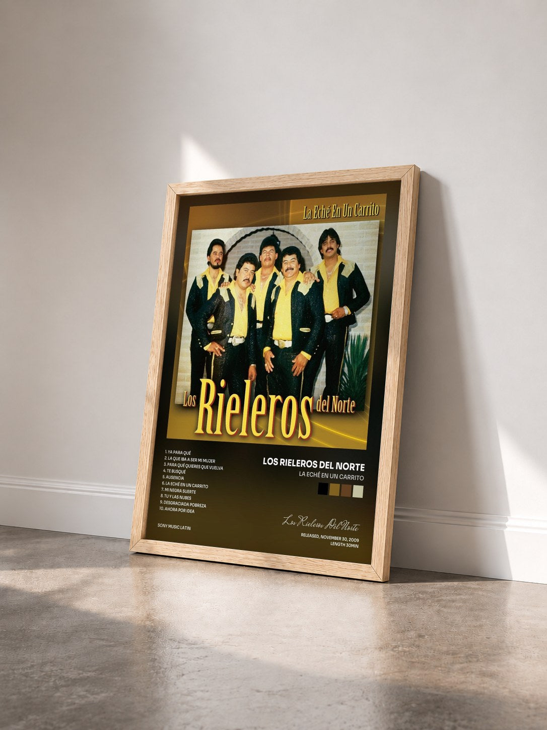 #bois Tableau de l'album La Eché En Un Carrito de Los Rieleros Del Norte vu de trois quarts, cadre en bois brut