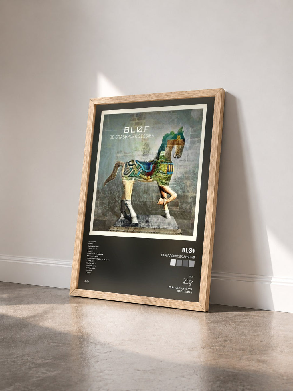 #bois Tableau de l'album De Grasbroek Sessies de Bløf vu de trois quarts, cadre en bois brut