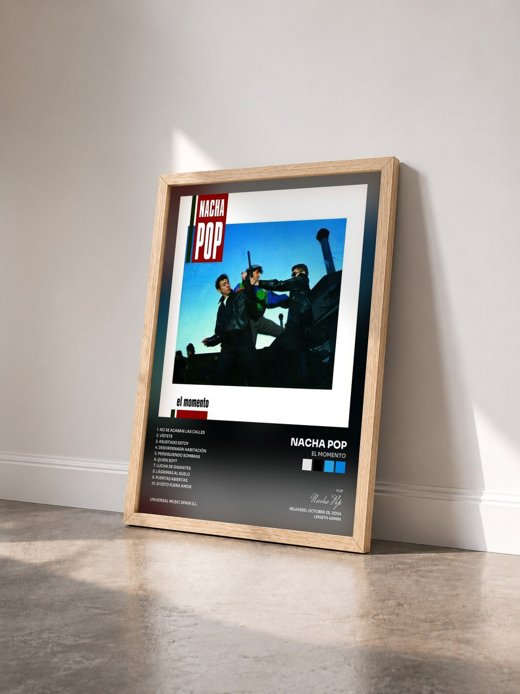 #bois Tableau de l'album El Momento de Nacha Pop vu de trois quarts, cadre en bois brut