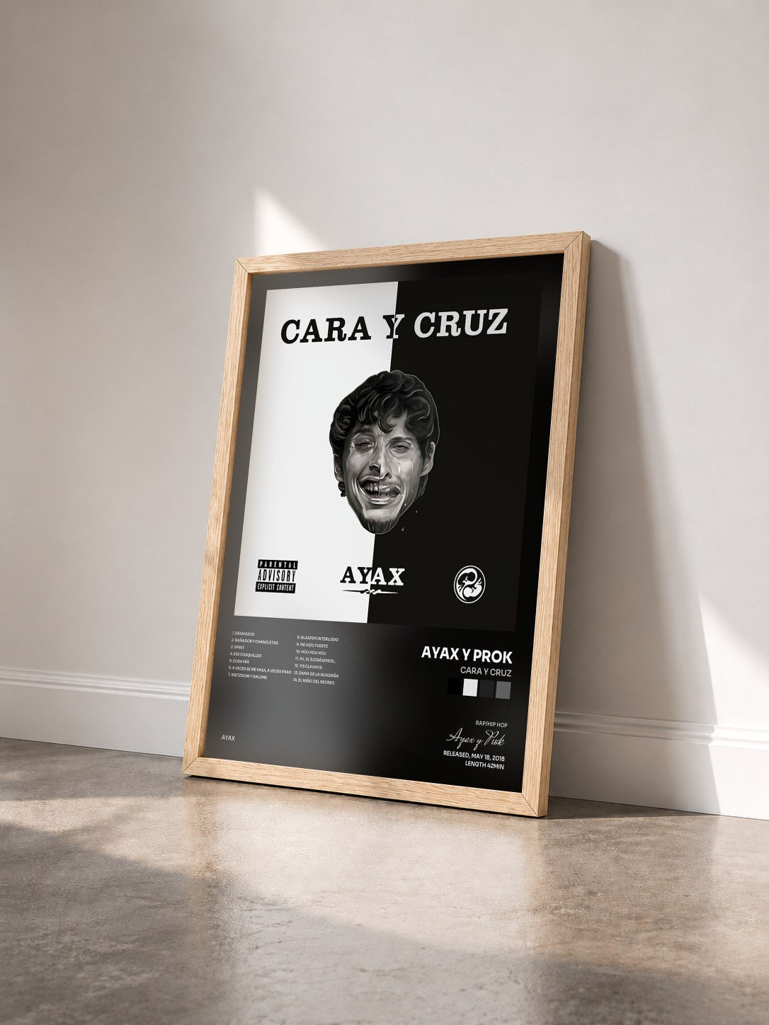 #bois Tableau de l'album Cara y cruz de Ayax y Prok vu de trois quarts, cadre en bois brut