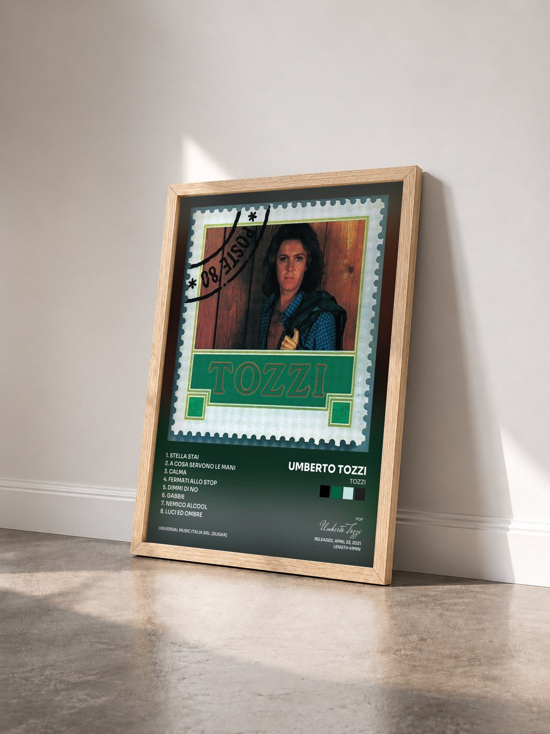 #bois Tableau de l'album Tozzi de Umberto Tozzi vu de trois quarts, cadre en bois brut