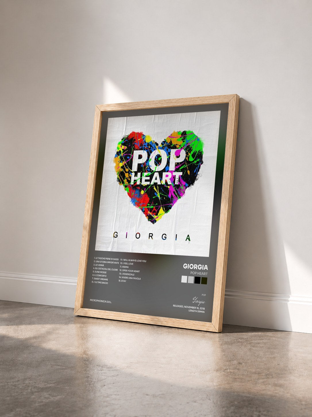 #bois Tableau de l'album Pop Heart de Giorgia vu de trois quarts, cadre en bois brut