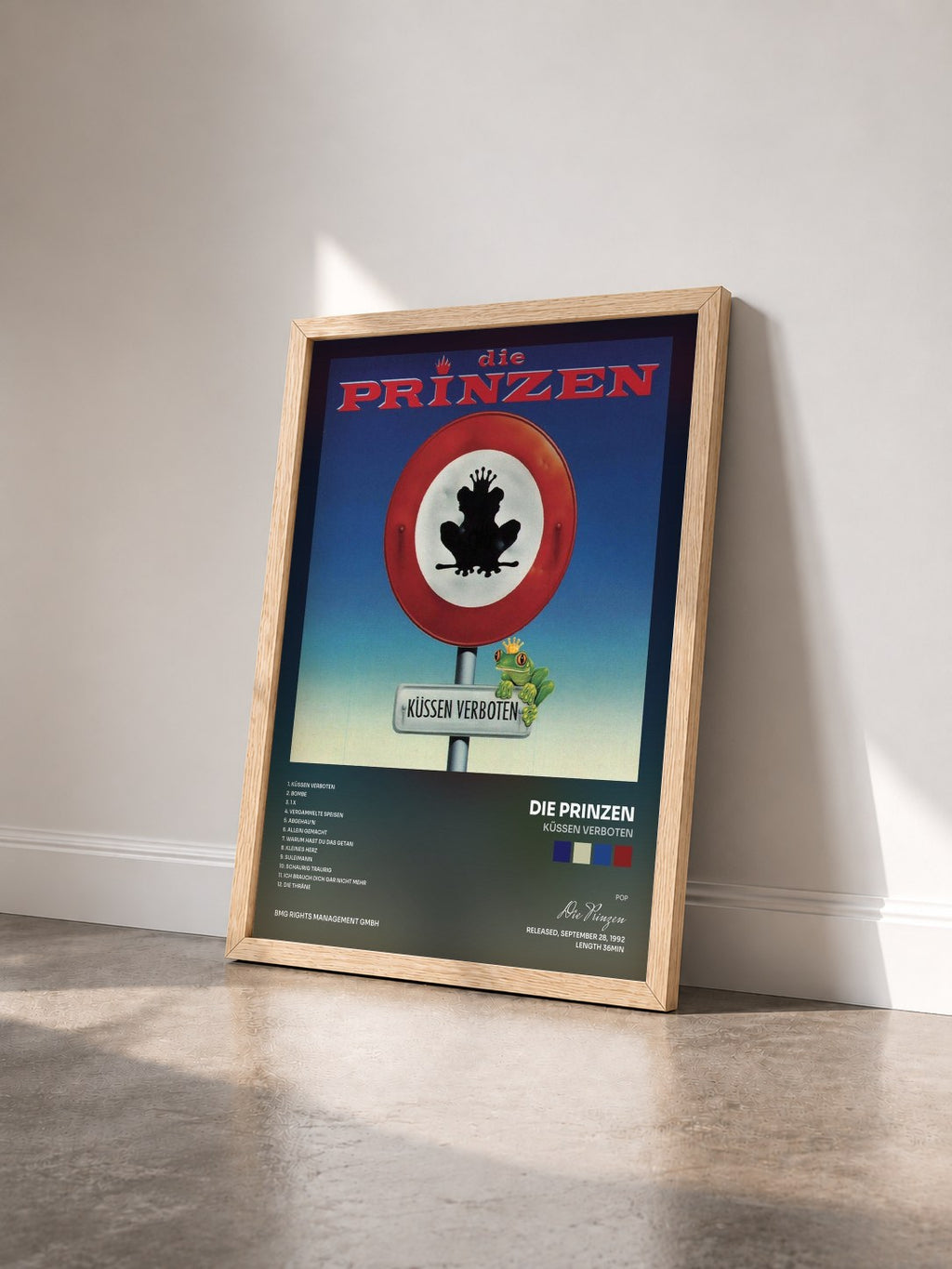 #bois Tableau de l'album Küssen verboten de Die Prinzen vu de trois quarts, cadre en bois brut