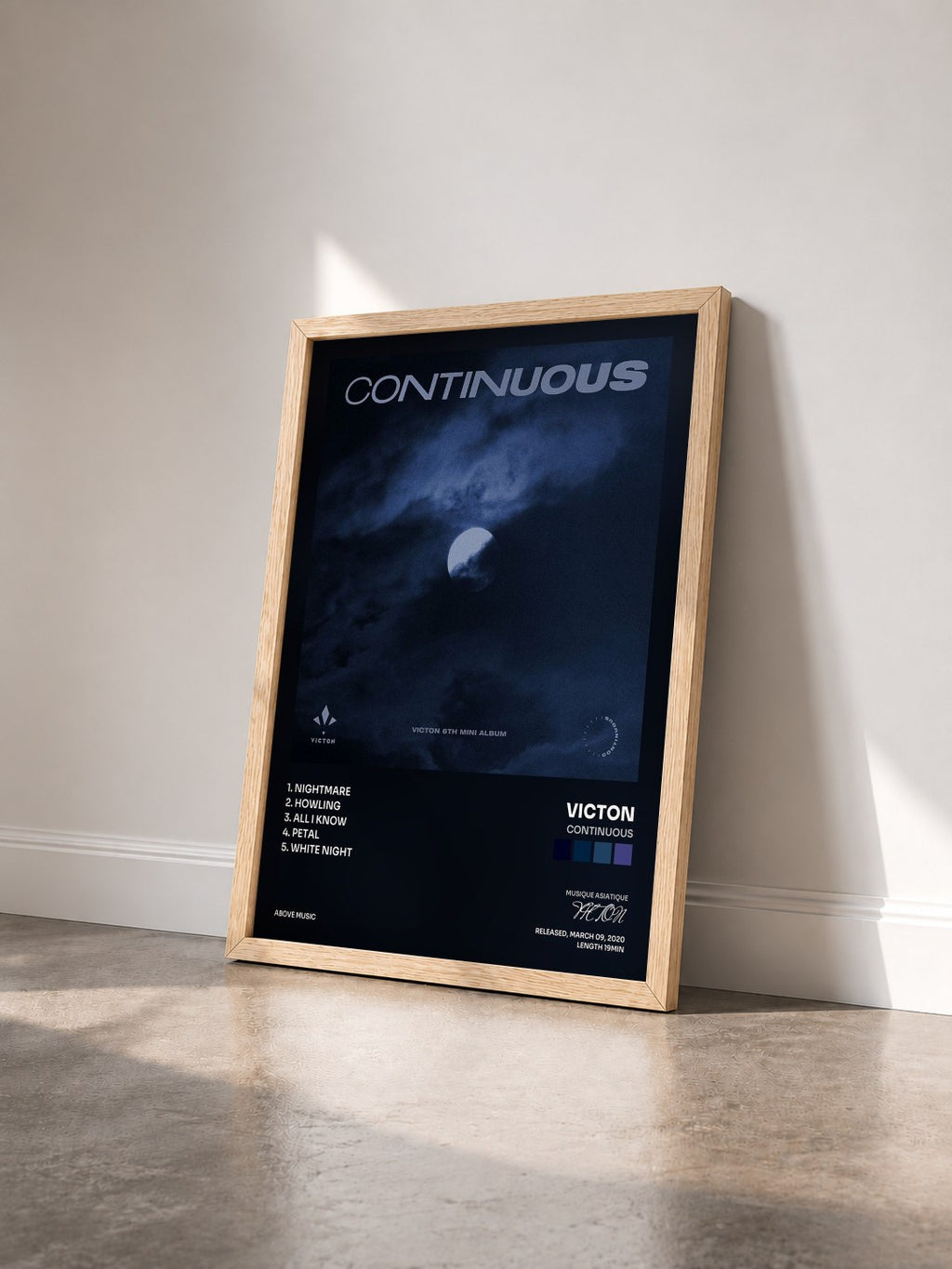 #bois Tableau de l'album Continuous de VICTON vu de trois quarts, cadre en bois brut