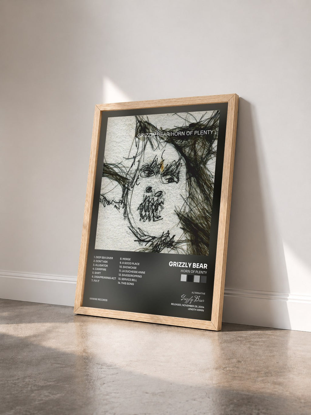 #bois Tableau de l'album Horn of Plenty de Grizzly Bear vu de trois quarts, cadre en bois brut