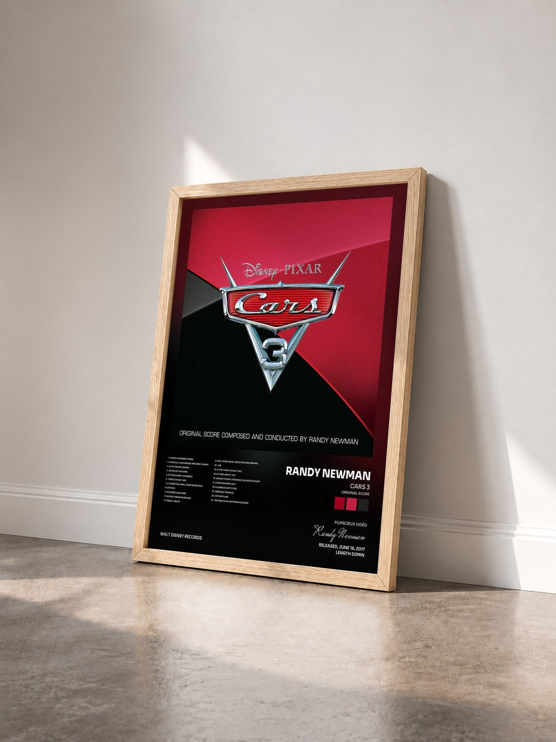 #bois Tableau de l'album Cars 3 (Original Score) de Randy Newman vu de trois quarts, cadre en bois brut