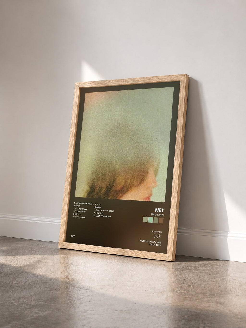#bois Tableau de l'album Two Lives de Wet vu de trois quarts, cadre en bois brut