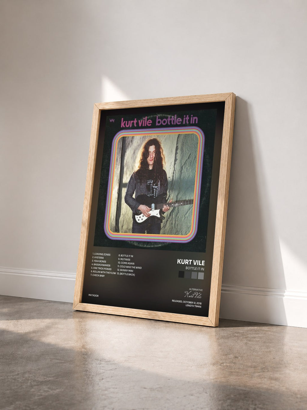 #bois Tableau de l'album Bottle It In de Kurt Vile vu de trois quarts, cadre en bois brut