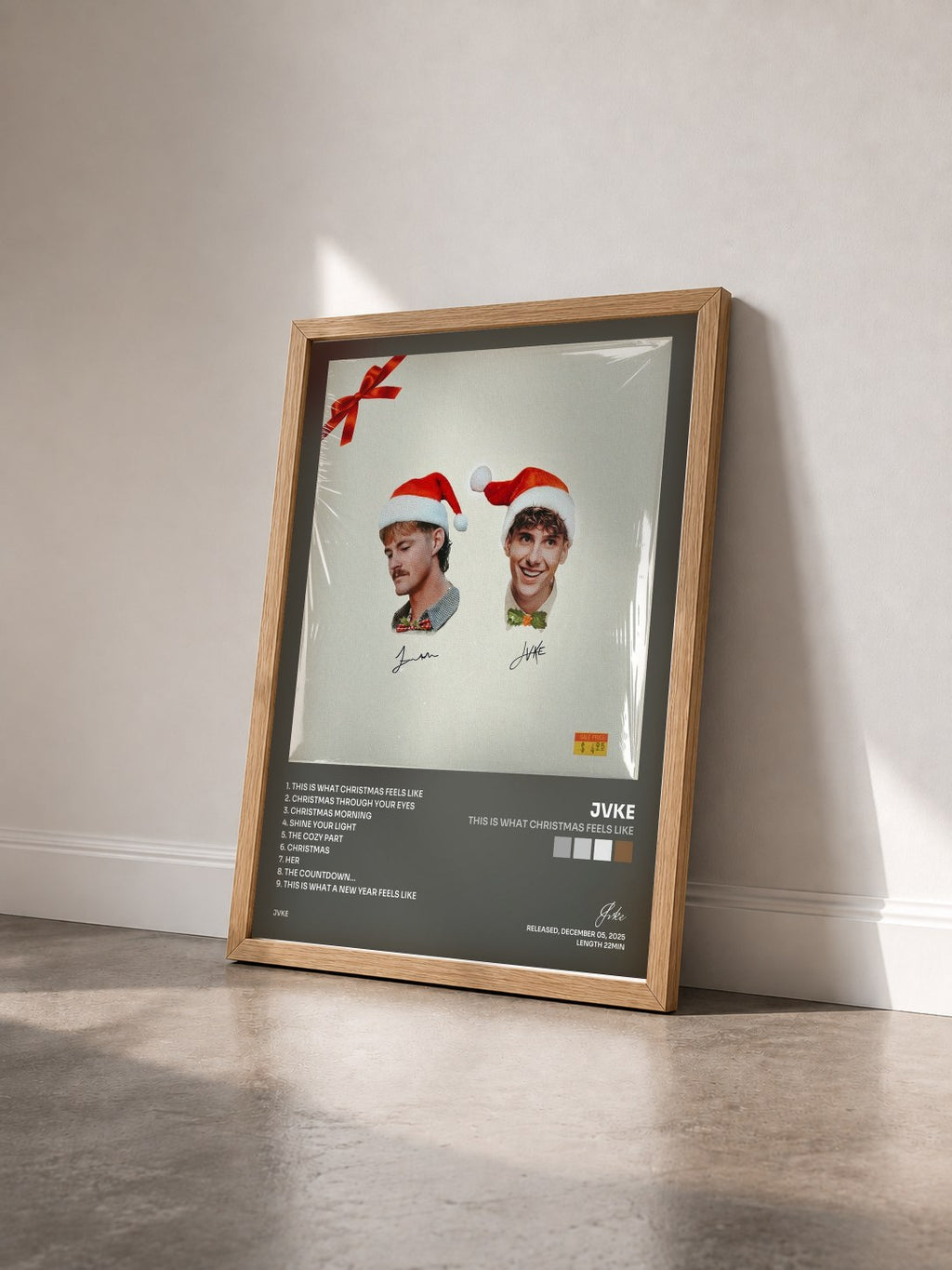 #bois Tableau de l'album this is what christmas feels like de Jvke vu de trois quarts, cadre en bois brut