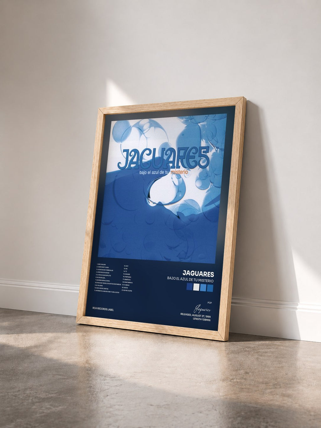 #bois Tableau de l'album Bajo El Azul De Tu Misterio de Jaguares vu de trois quarts, cadre en bois brut