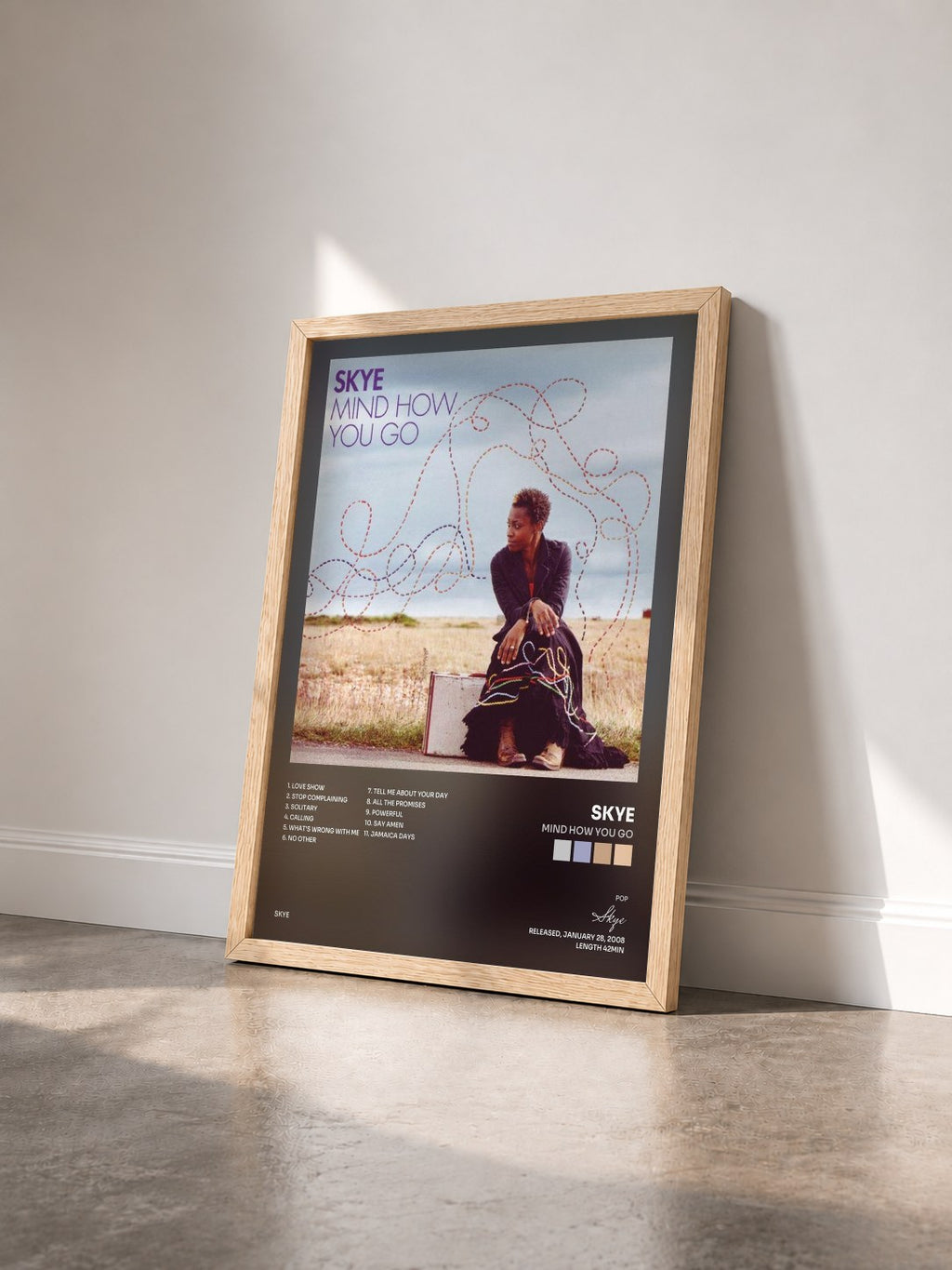 #bois Tableau de l'album Mind How You Go de Skye vu de trois quarts, cadre en bois brut