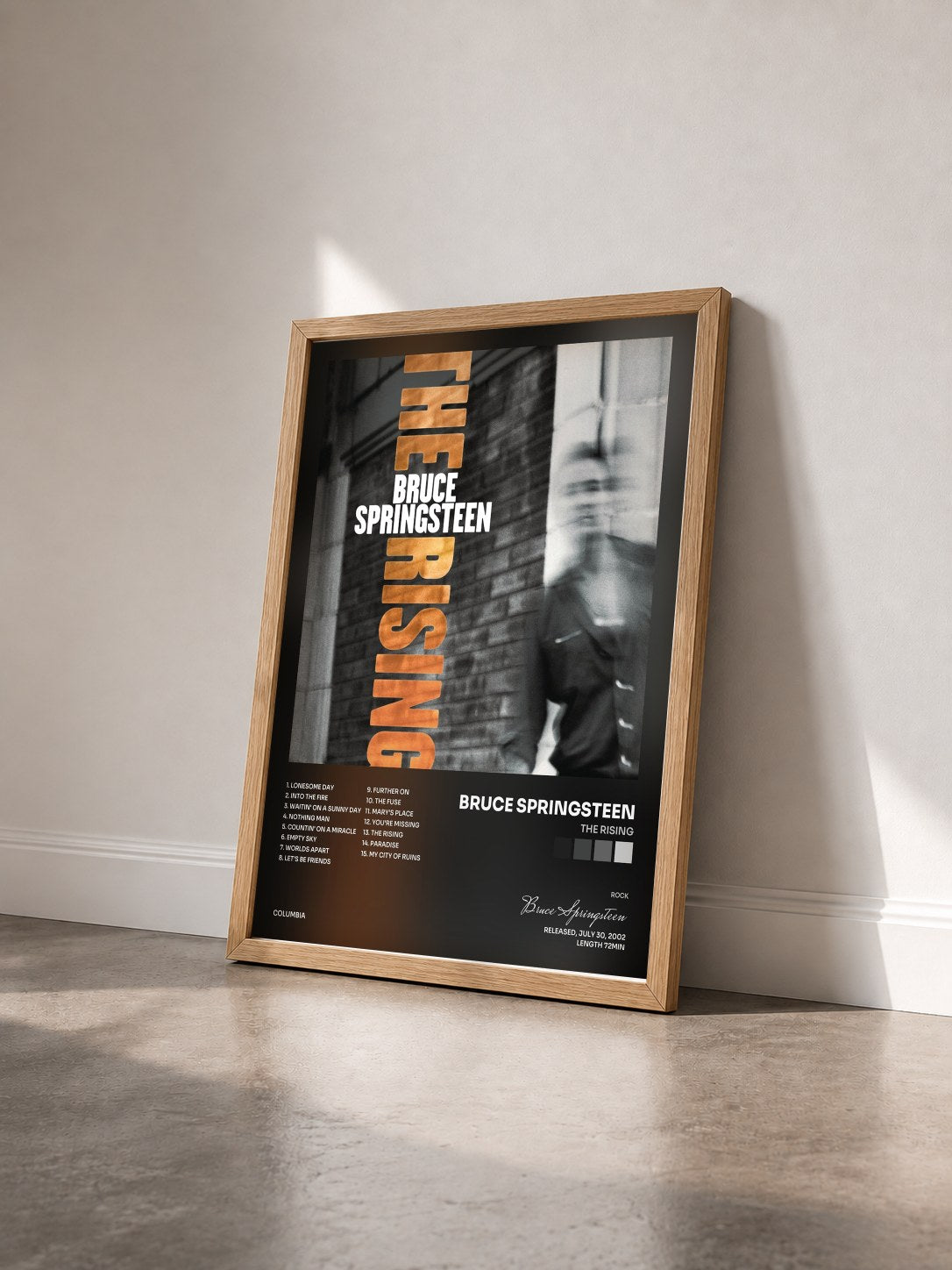 #bois Tableau de l'album The Rising de Bruce Springsteen vu de trois quarts, cadre en bois brut