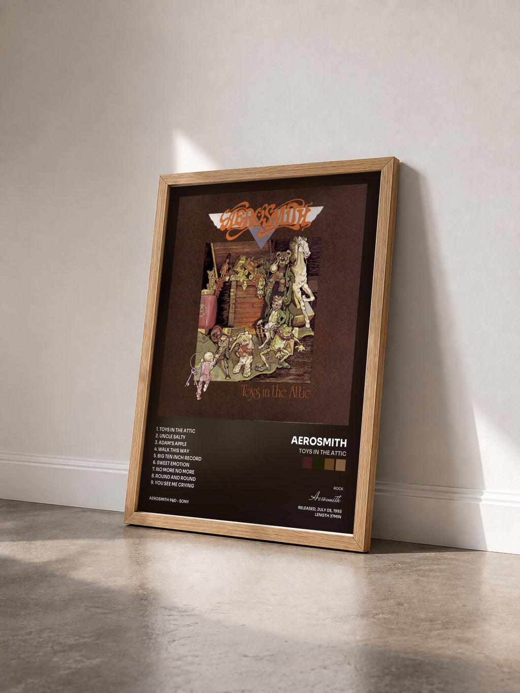 #bois Tableau de l'album Toys In The Attic de Aerosmith vu de trois quarts, cadre en bois brut