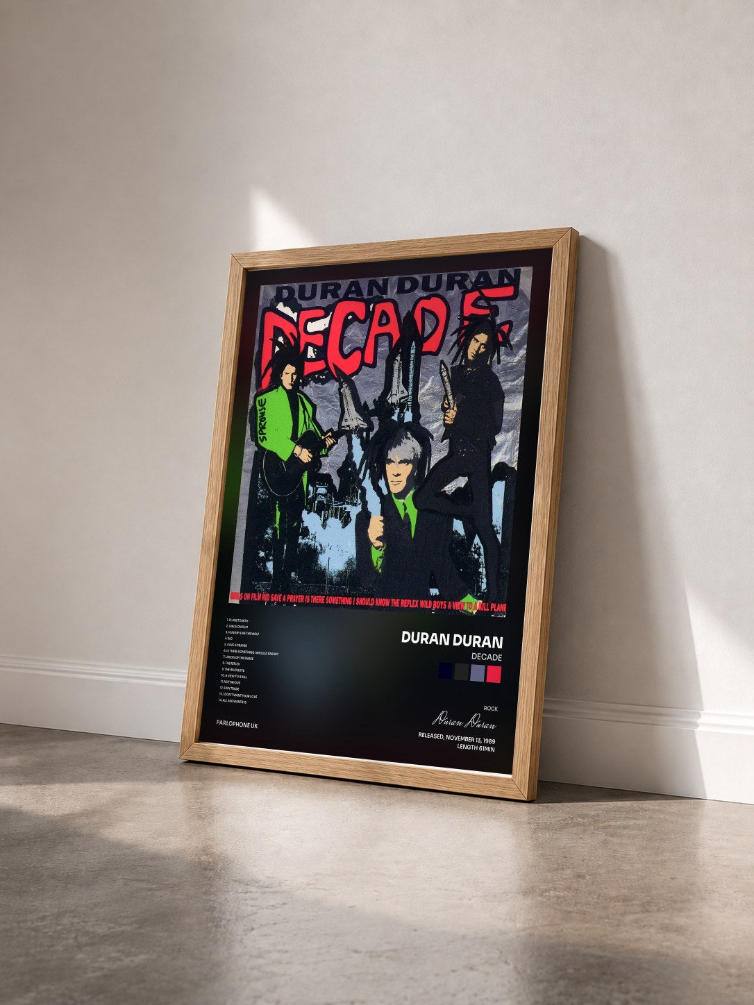 #bois Tableau de l'album Decade de Duran Duran vu de trois quarts, cadre en bois brut