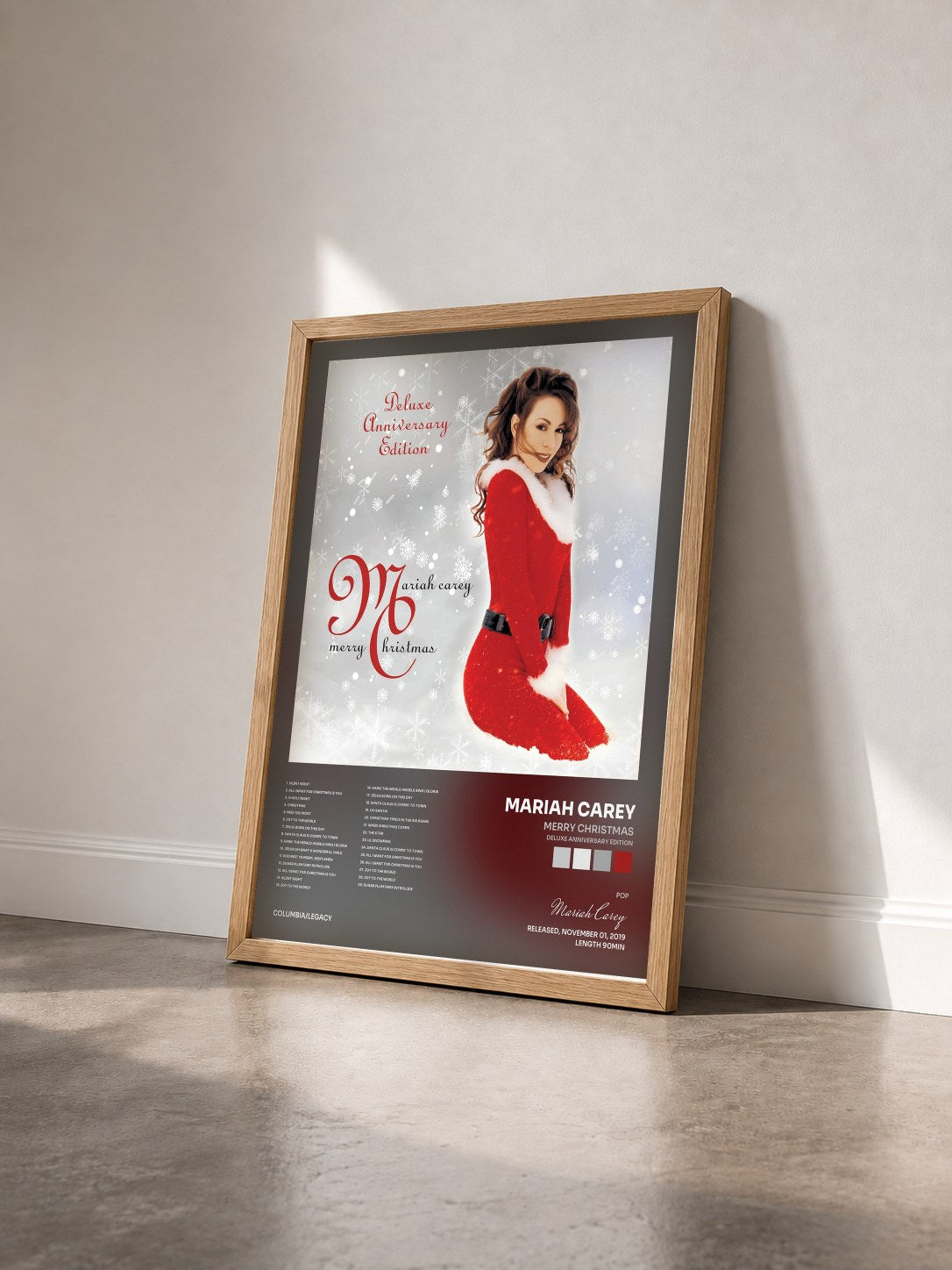 #bois Tableau de l'album Merry Christmas (Deluxe Anniversary Edition) de Mariah Carey vu de trois quarts, cadre en bois brut