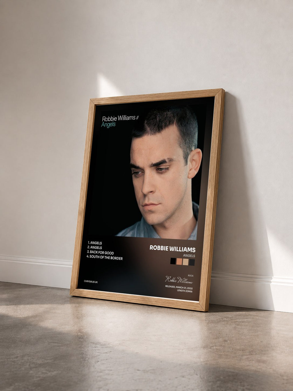 #bois Tableau de l'album Angels de Robbie Williams vu de trois quarts, cadre en bois brut