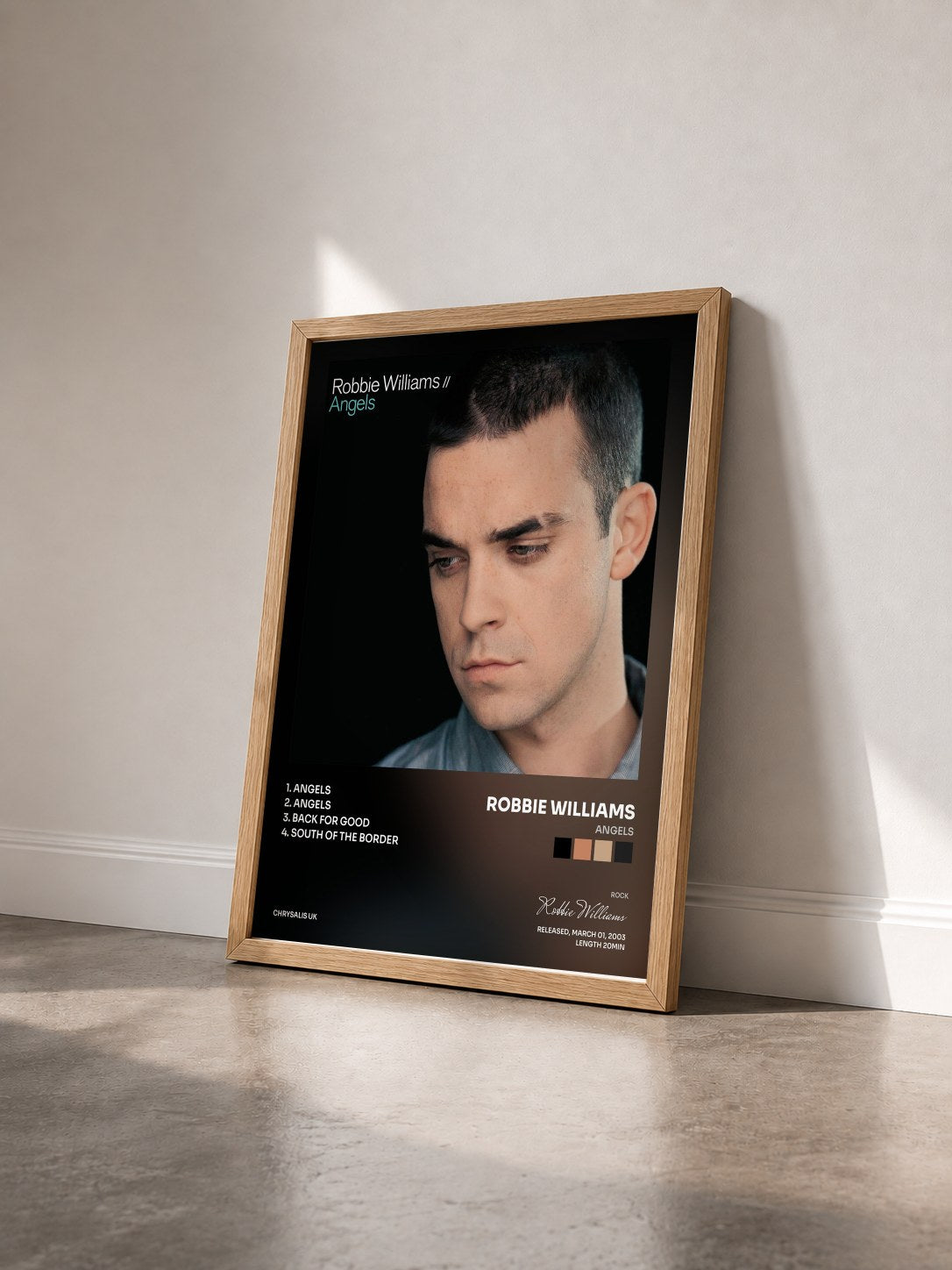 #bois Tableau de l'album Angels de Robbie Williams vu de trois quarts, cadre en bois brut