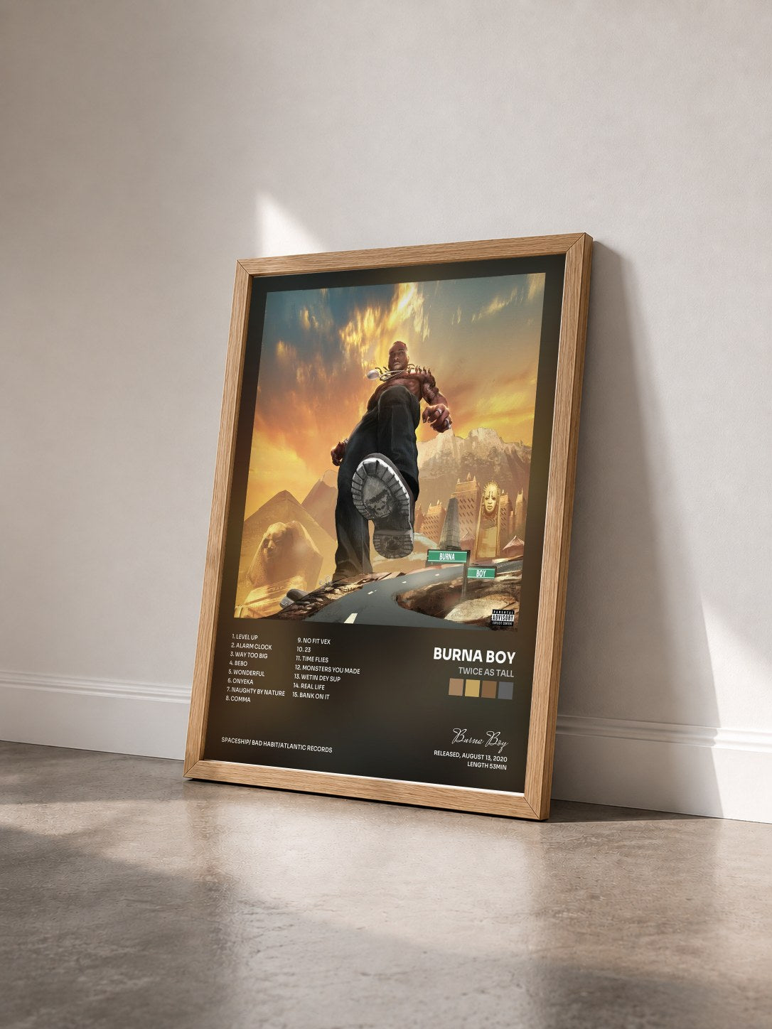 #bois Tableau de l'album Twice As Tall de Burna Boy vu de trois quarts, cadre en bois brut