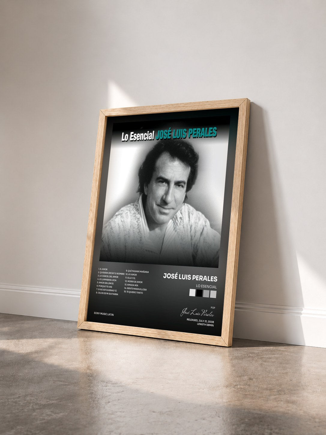 #bois Tableau de l'album Lo Esencial de José Luis Perales vu de trois quarts, cadre en bois brut