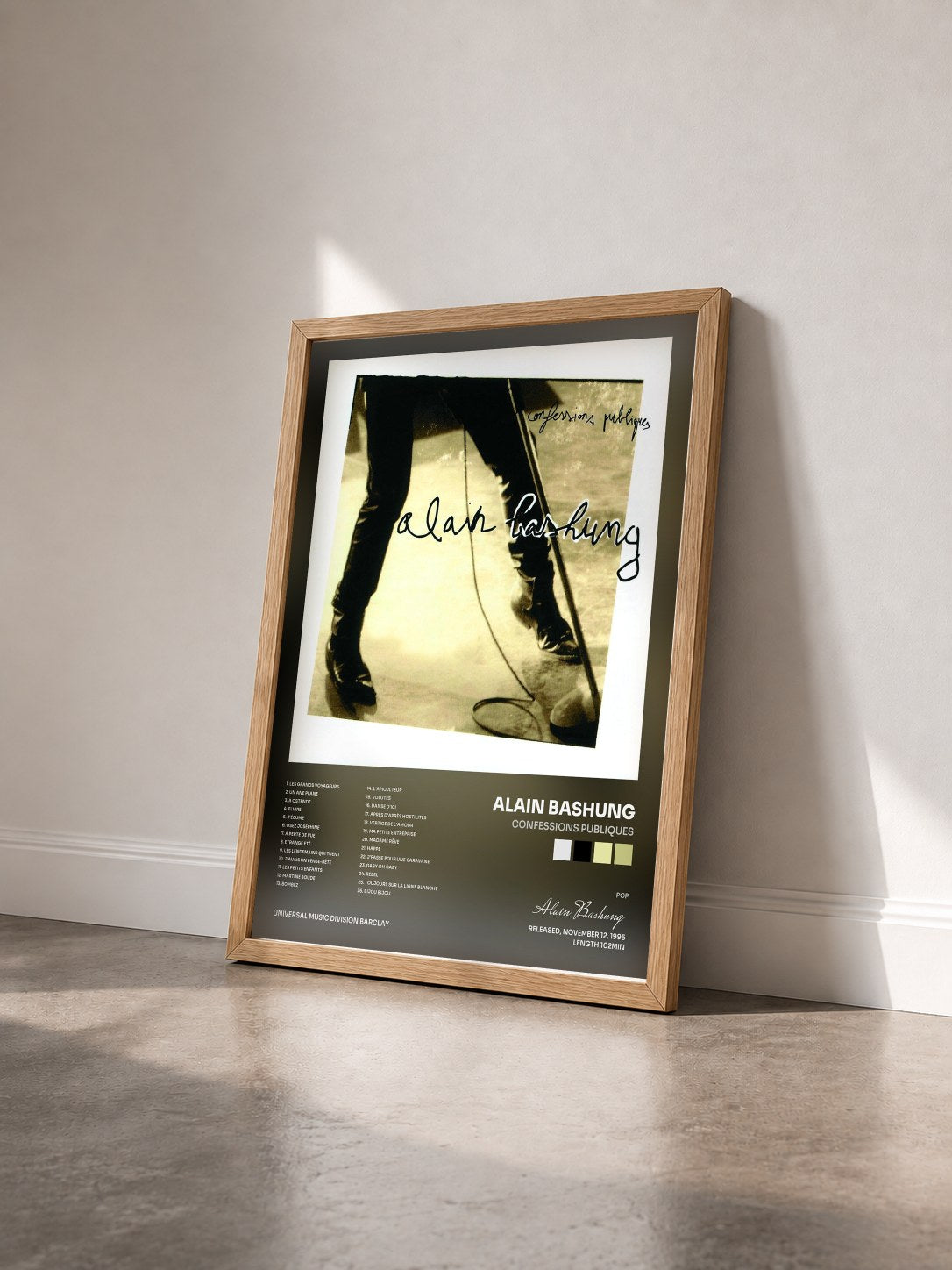 #bois Tableau de l'album Confessions Publiques de Alain Bashung vu de trois quarts, cadre en bois brut