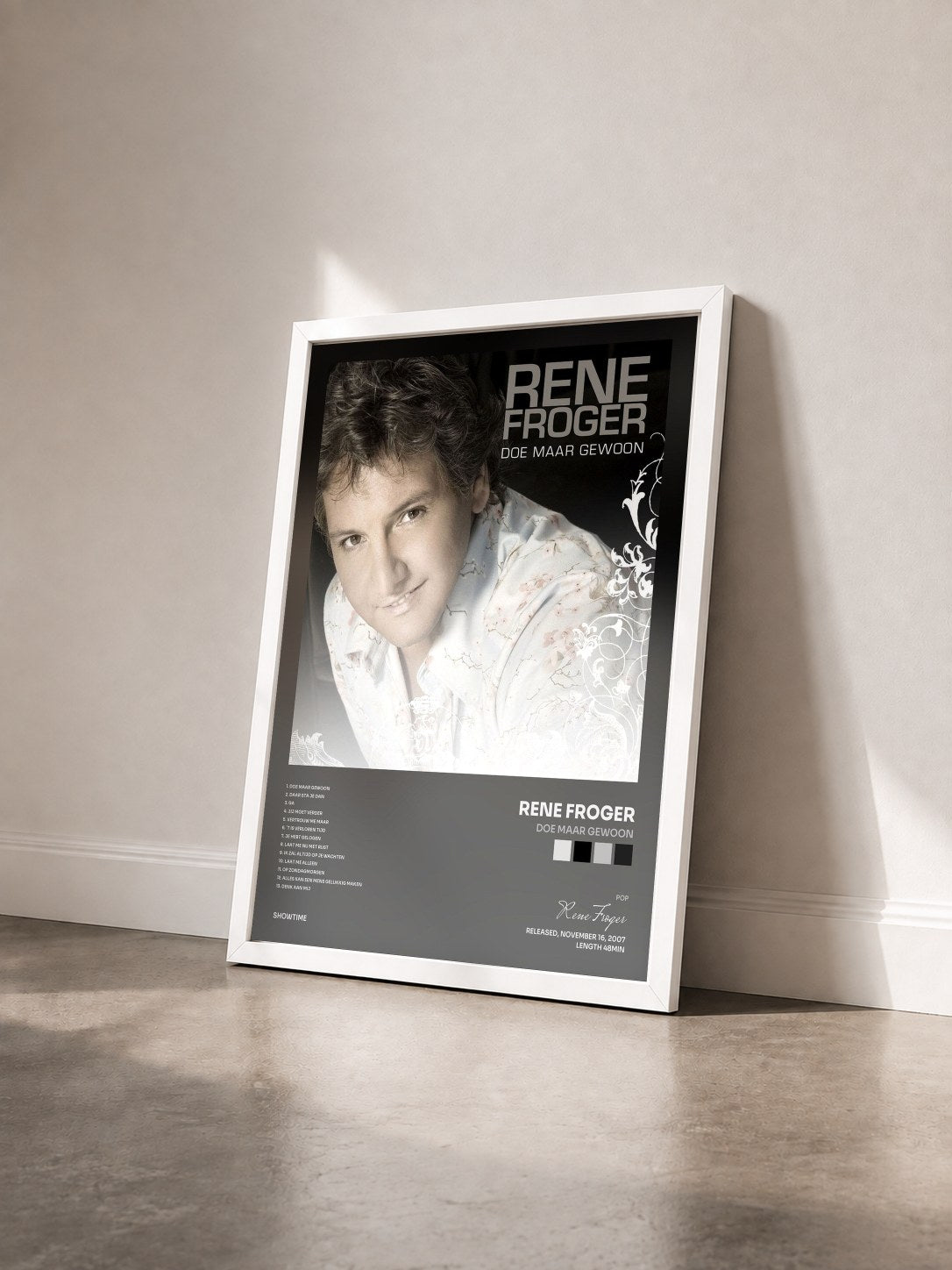 #blanc Tableau de l'album Doe Maar Gewoon de Rene Froger vu de trois quarts, cadre blanc