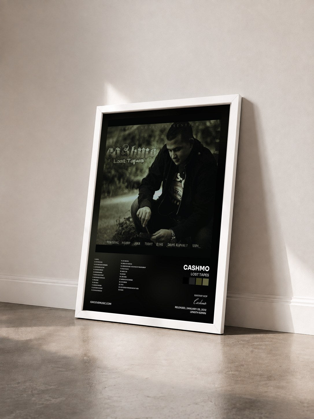 #blanc Tableau de l'album Lost Tapes de Cashmo vu de trois quarts, cadre blanc