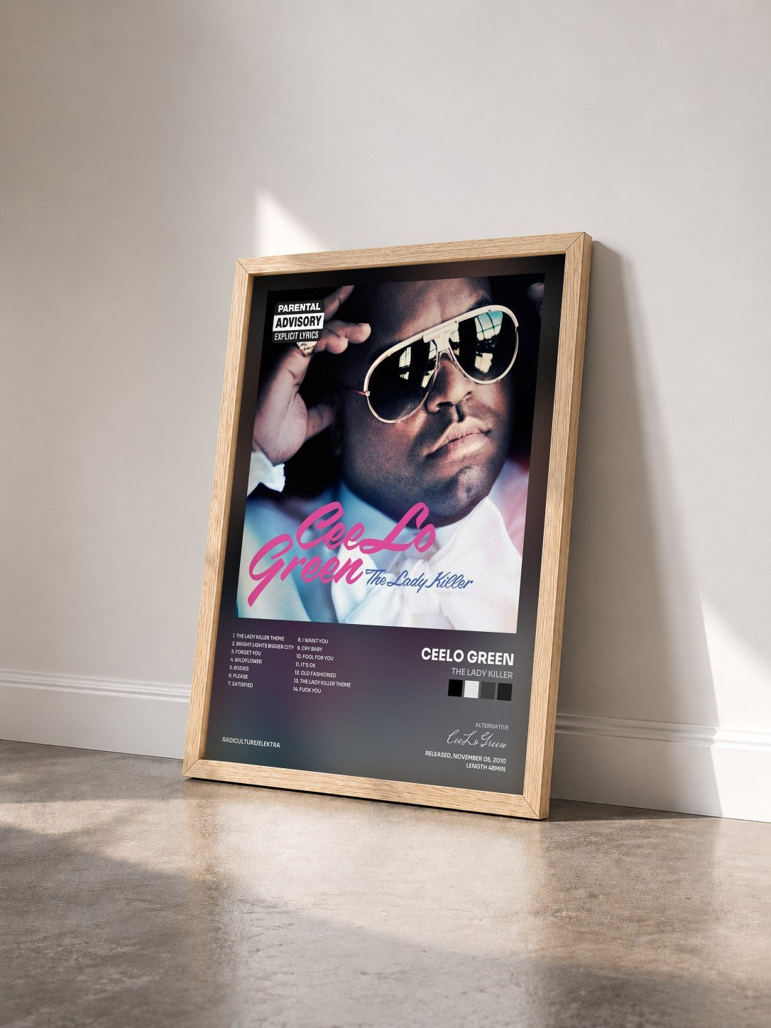 #bois Tableau de l'album The Lady Killer de CeeLo Green vu de trois quarts, cadre en bois brut