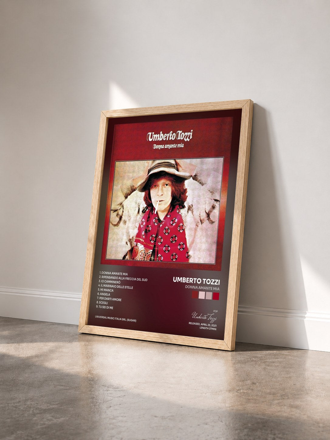 #bois Tableau de l'album Donna amante mia de Umberto Tozzi vu de trois quarts, cadre en bois brut