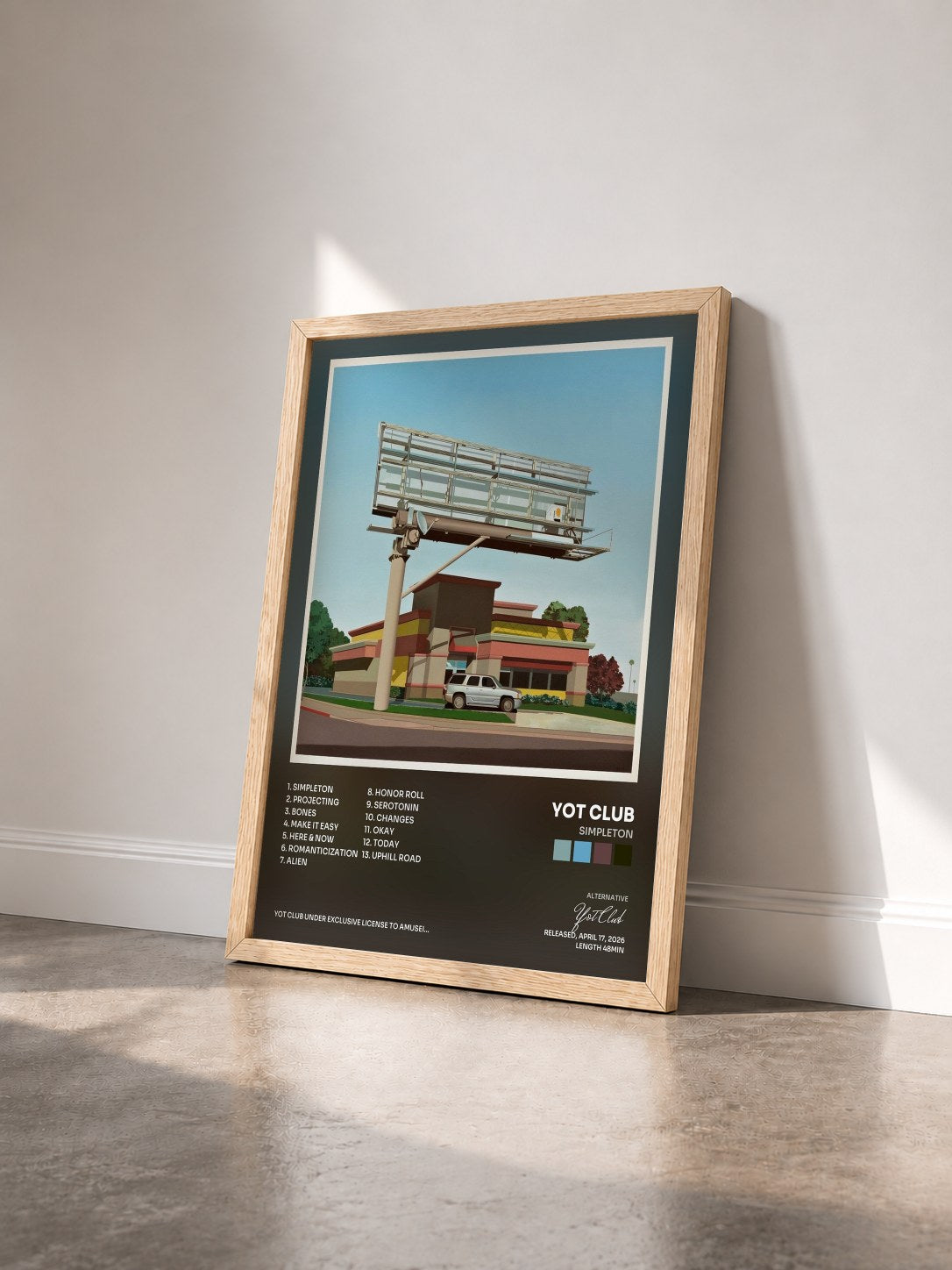 #bois Tableau de l'album Simpleton de Yot Club vu de trois quarts, cadre en bois brut