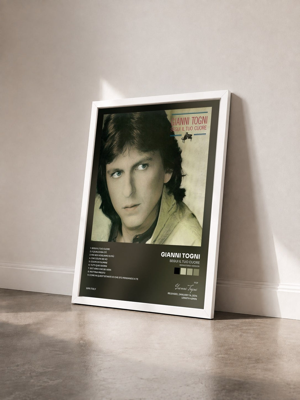 #blanc Tableau de l'album Segui il tuo cuore (Remastered Version) de Gianni Togni vu de trois quarts, cadre blanc