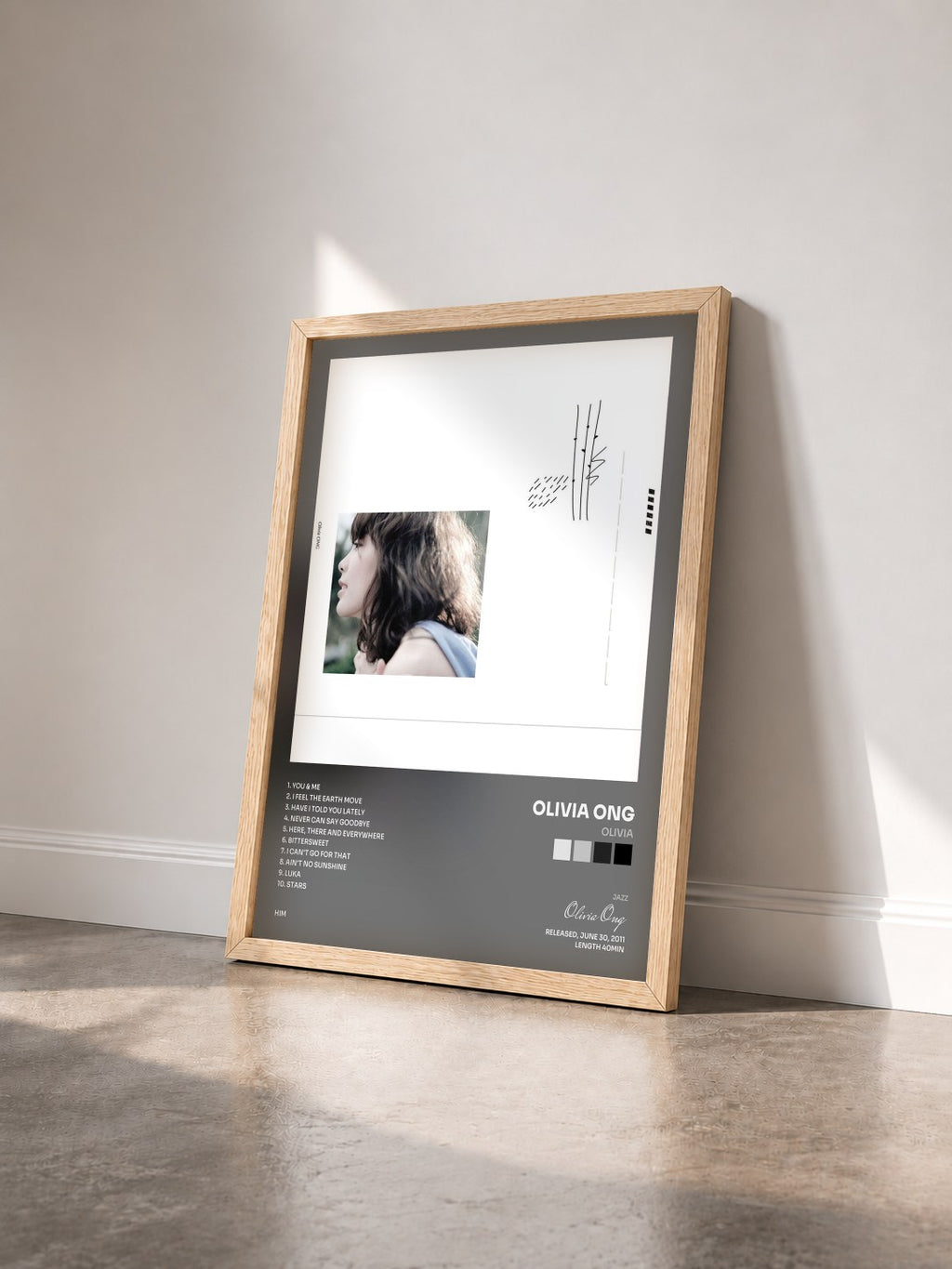 #bois Tableau de l'album Olivia de Olivia Ong vu de trois quarts, cadre en bois brut