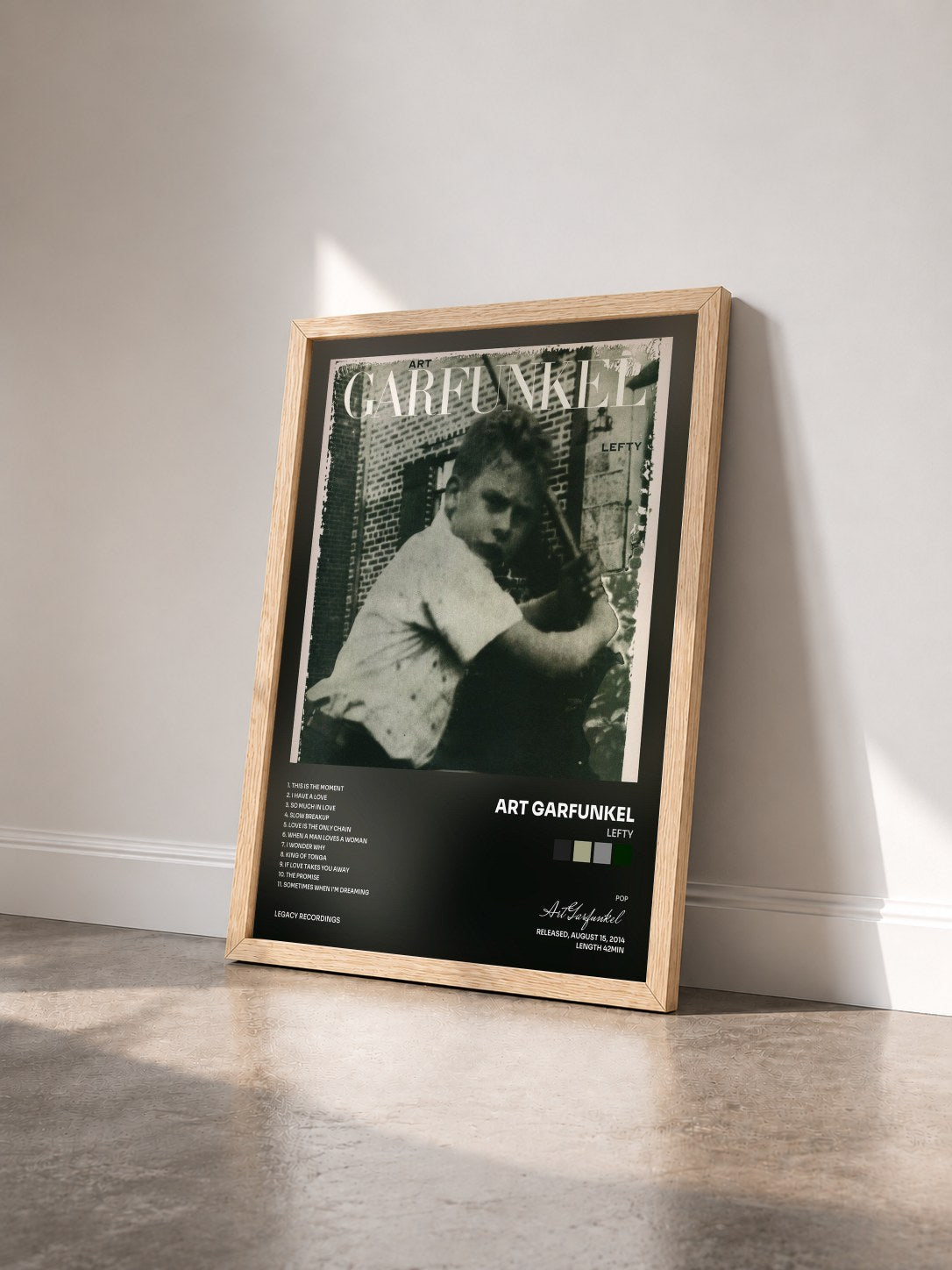 #bois Tableau de l'album Lefty de Art Garfunkel vu de trois quarts, cadre en bois brut