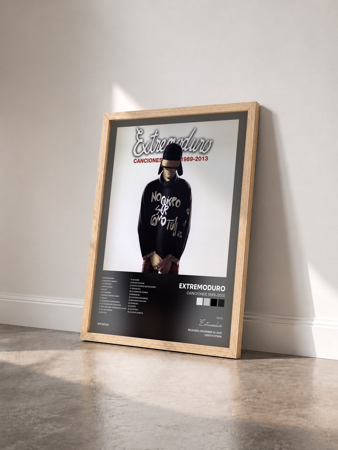 #bois Tableau de l'album Canciones 1989-2013 de Extremoduro vu de trois quarts, cadre en bois brut