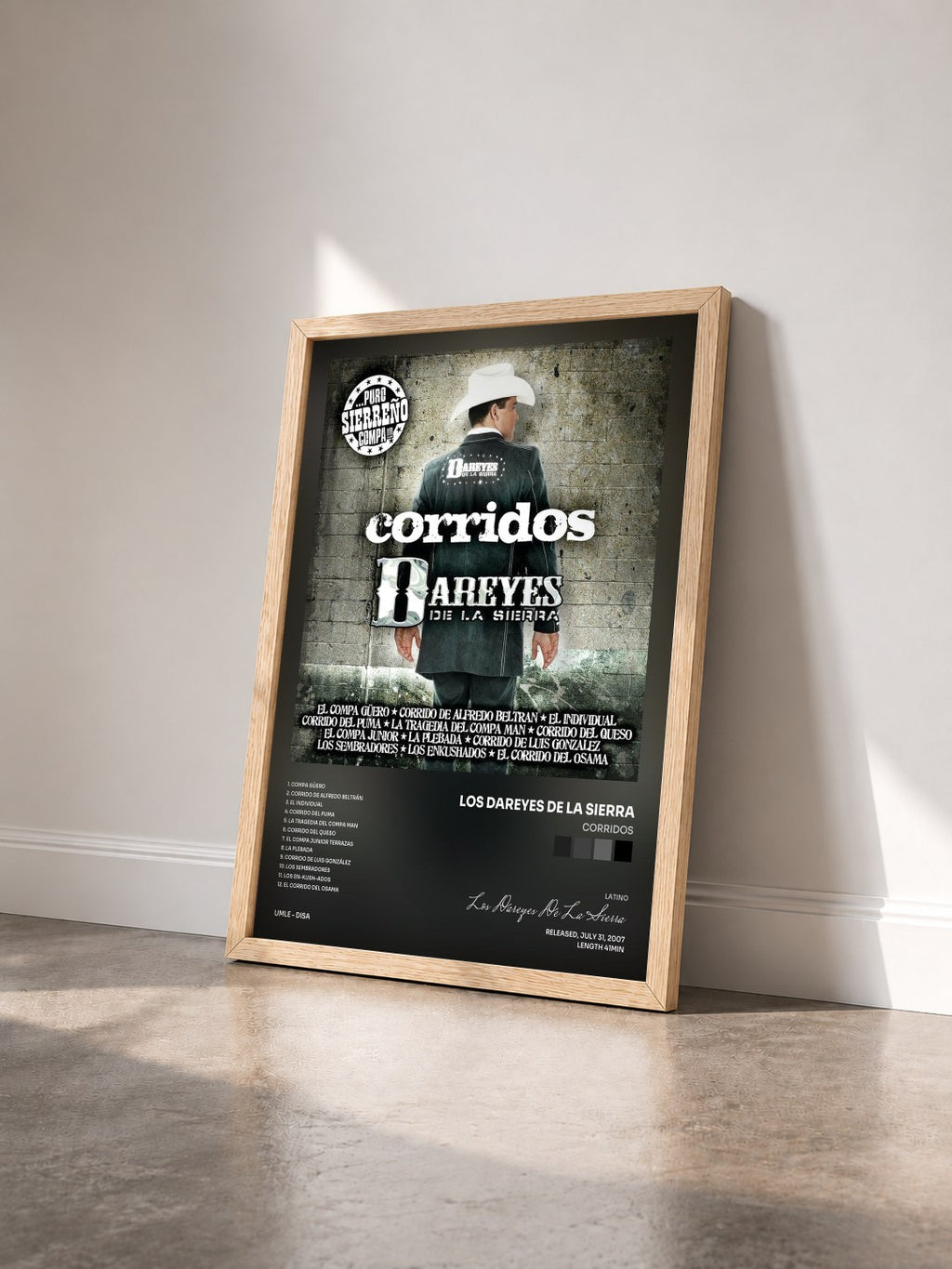 #bois Tableau de l'album Corridos de Los Dareyes De La Sierra vu de trois quarts, cadre en bois brut