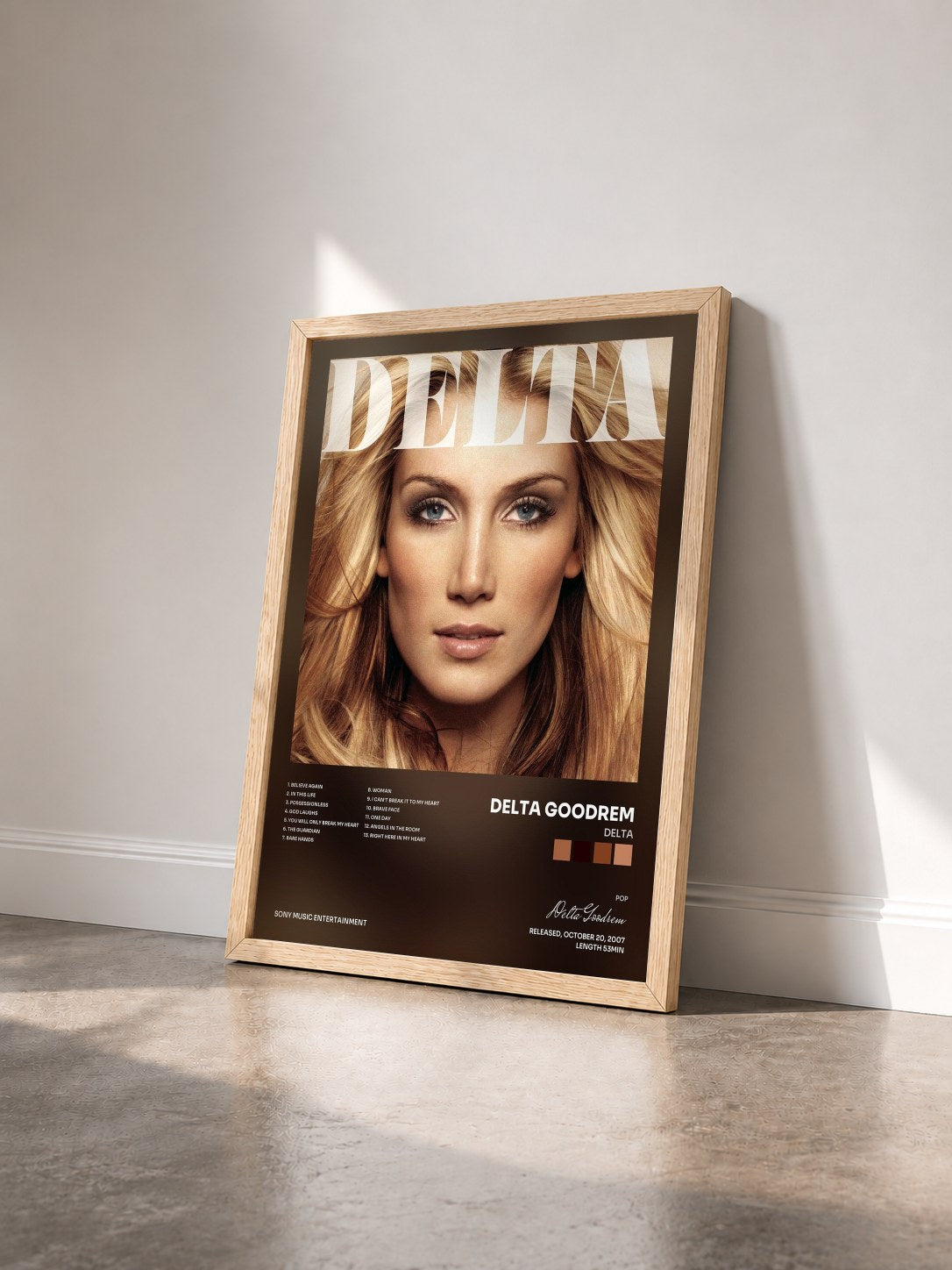 #bois Tableau de l'album Delta de Delta Goodrem vu de trois quarts, cadre en bois brut