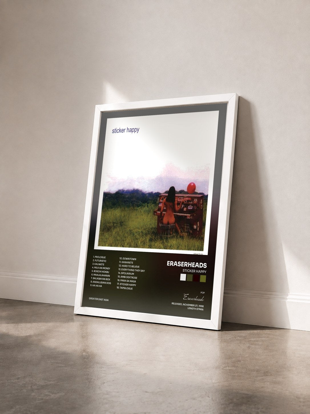 #blanc Tableau de l'album Sticker Happy de Eraserheads vu de trois quarts, cadre blanc