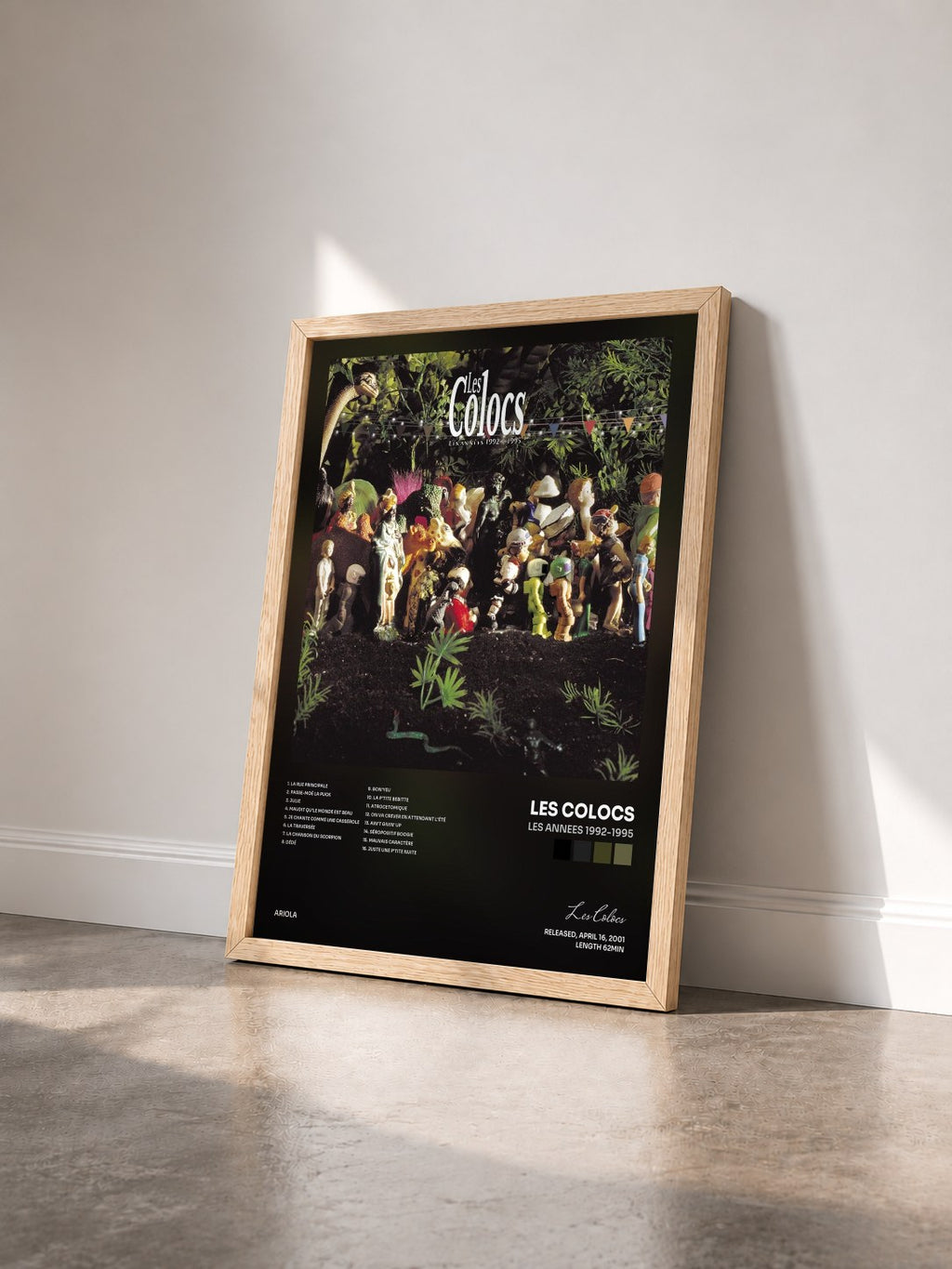 #bois Tableau de l'album Les Annees 1992-1995 de Les Colocs vu de trois quarts, cadre en bois brut
