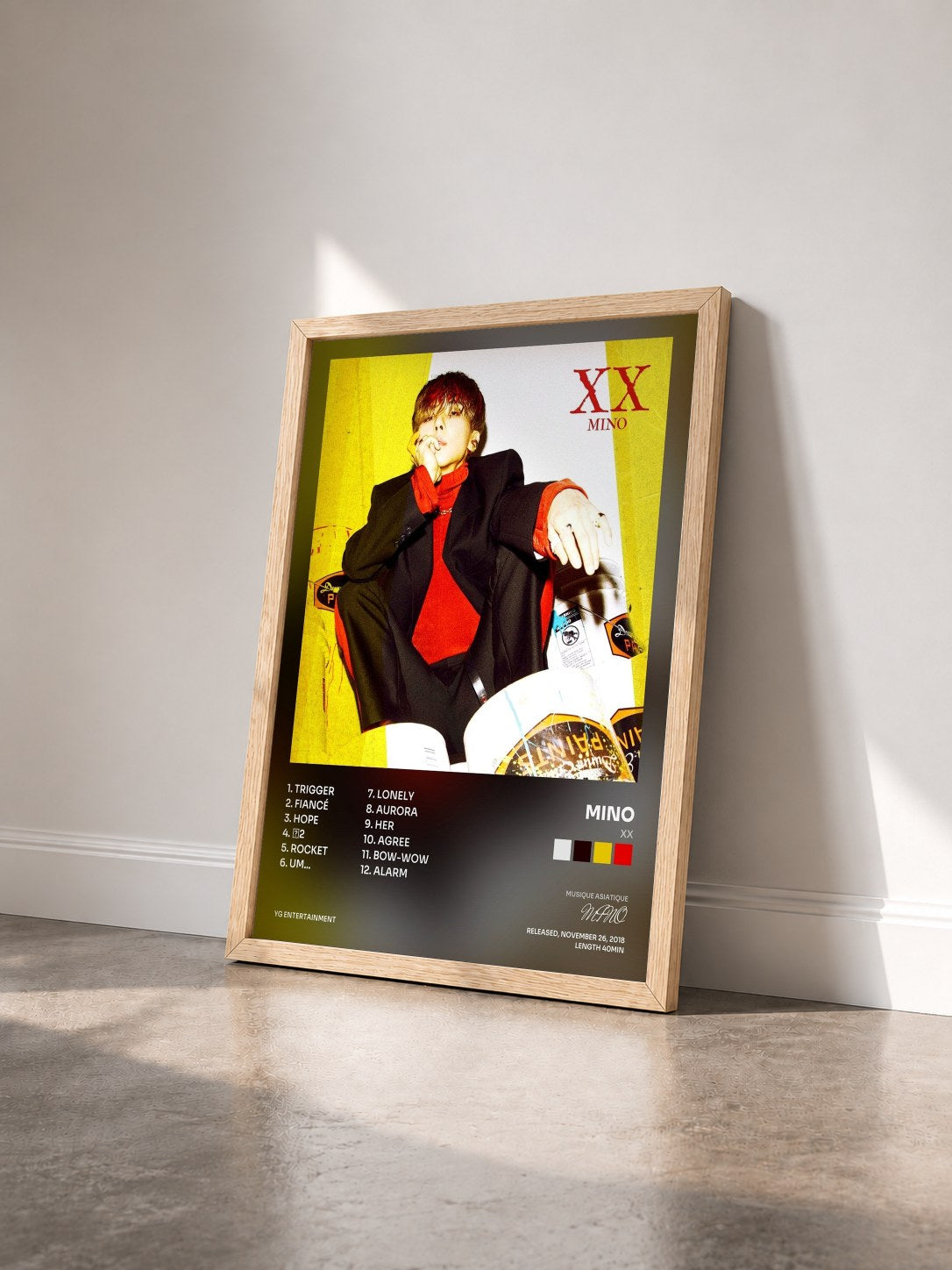 #bois Tableau de l'album XX de MINO vu de trois quarts, cadre en bois brut