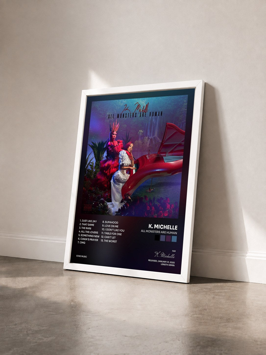 #blanc Tableau de l'album All Monsters Are Human de K. Michelle vu de trois quarts, cadre blanc