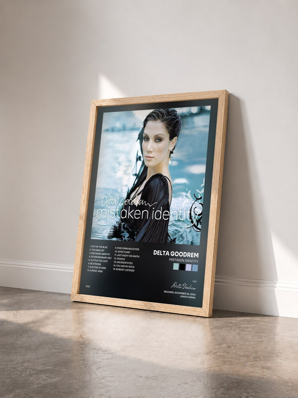 #bois Tableau de l'album Mistaken Identity de Delta Goodrem vu de trois quarts, cadre en bois brut