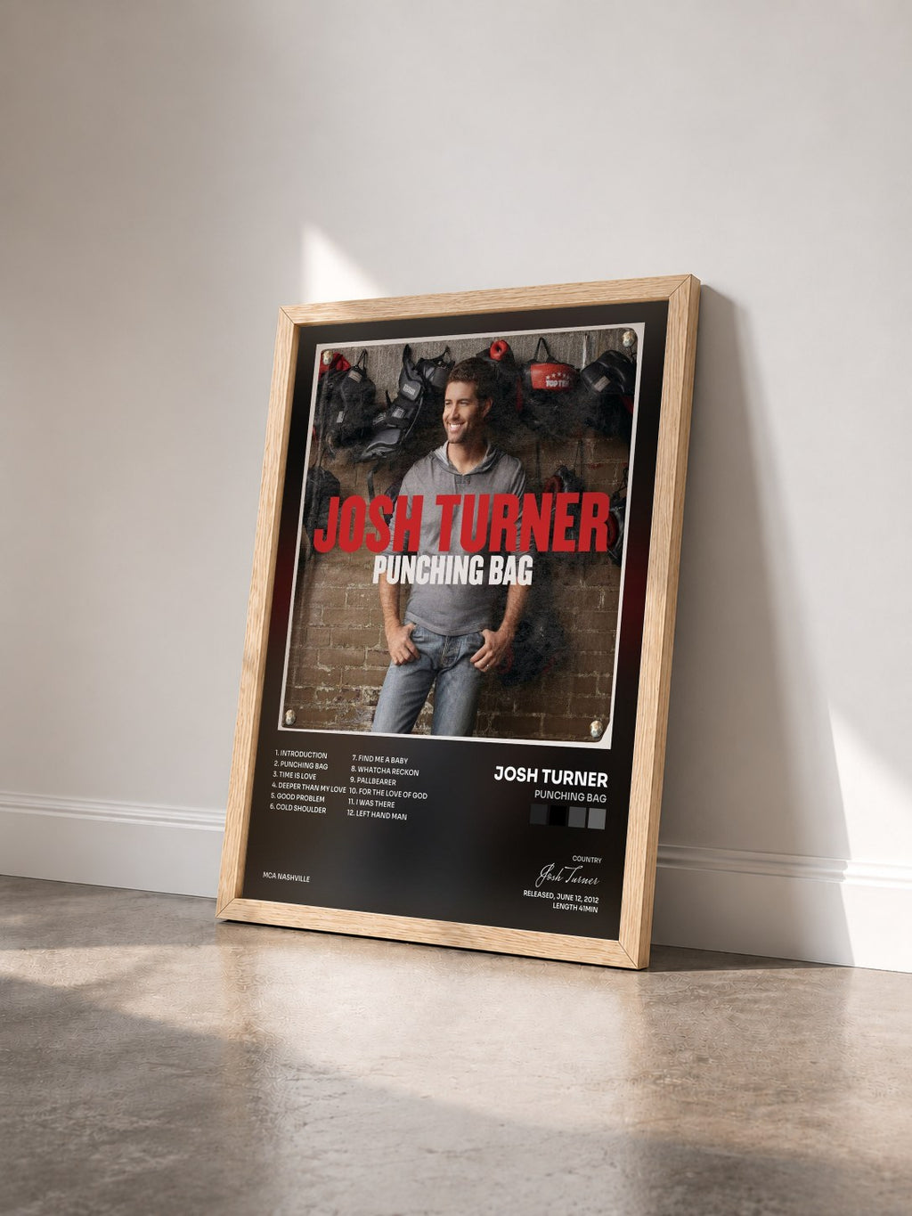 #bois Tableau de l'album Punching Bag de Josh Turner vu de trois quarts, cadre en bois brut