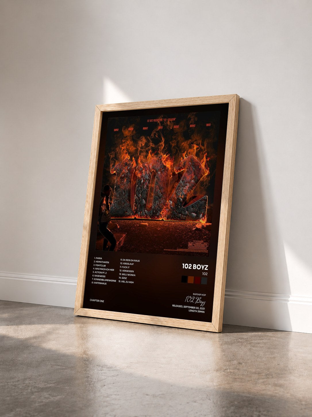 #bois Tableau de l'album 102 de 102 Boyz vu de trois quarts, cadre en bois brut