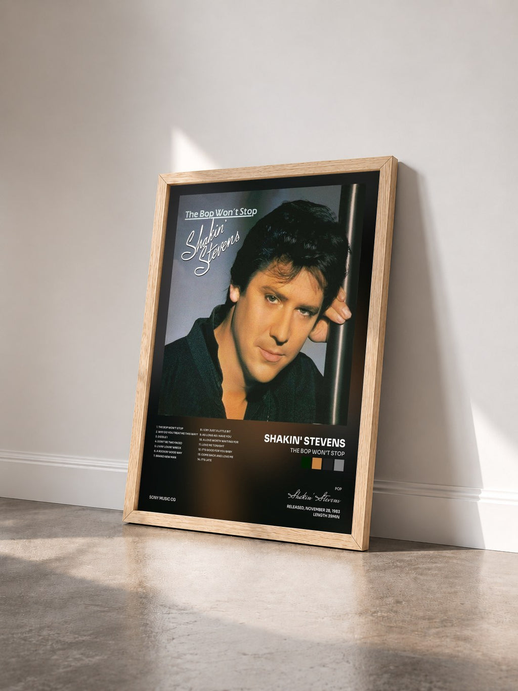 #bois Tableau de l'album The Bop Won't Stop de Shakin' Stevens vu de trois quarts, cadre en bois brut