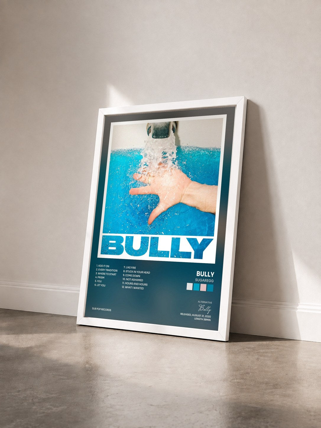 #blanc Tableau de l'album SUGAREGG de Bully vu de trois quarts, cadre blanc