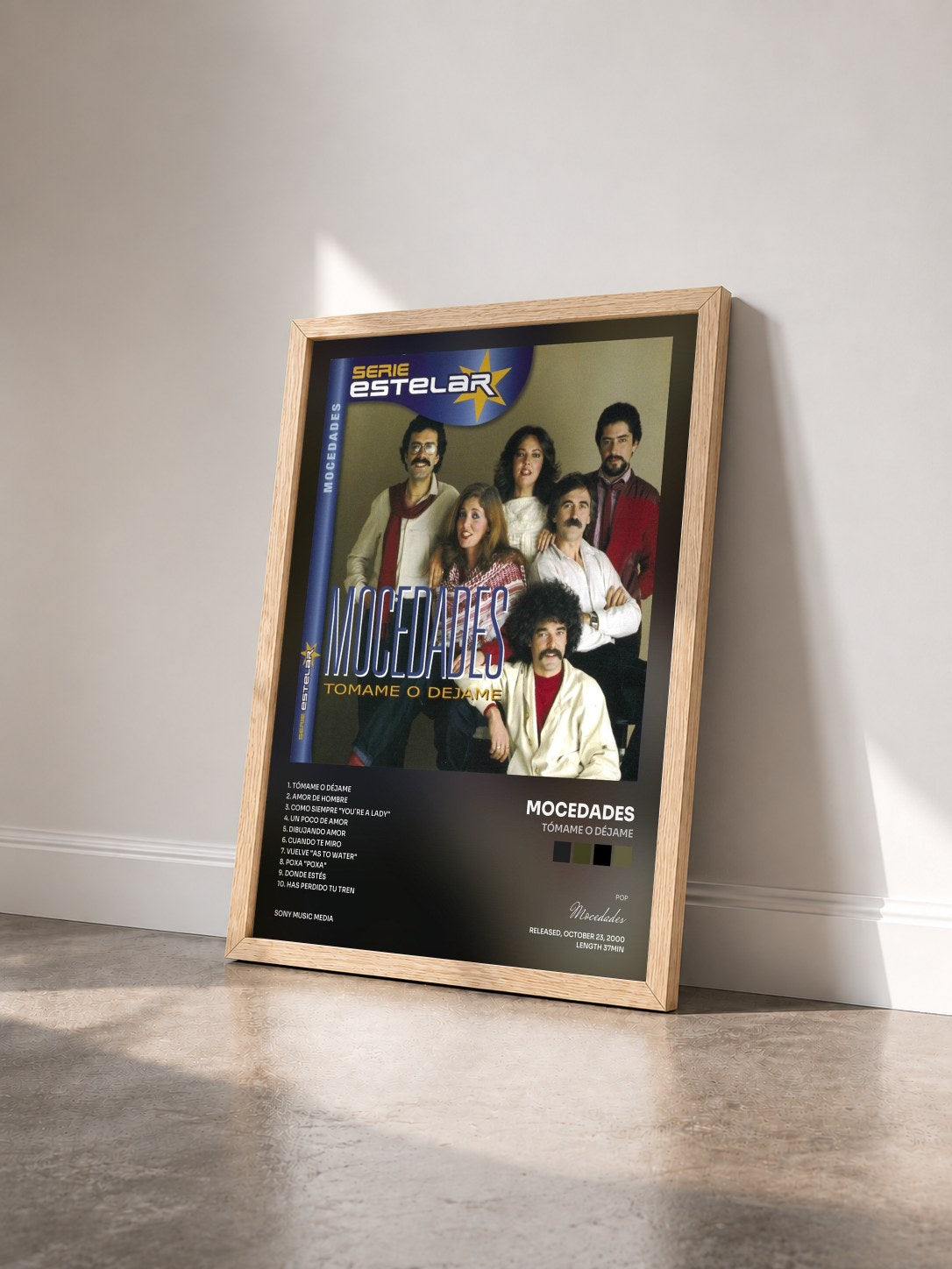 #bois Tableau de l'album Tómame O Déjame de Mocedades vu de trois quarts, cadre en bois brut