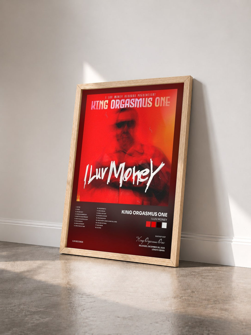 #bois Tableau de l'album I Luv Money de King Orgasmus One vu de trois quarts, cadre en bois brut
