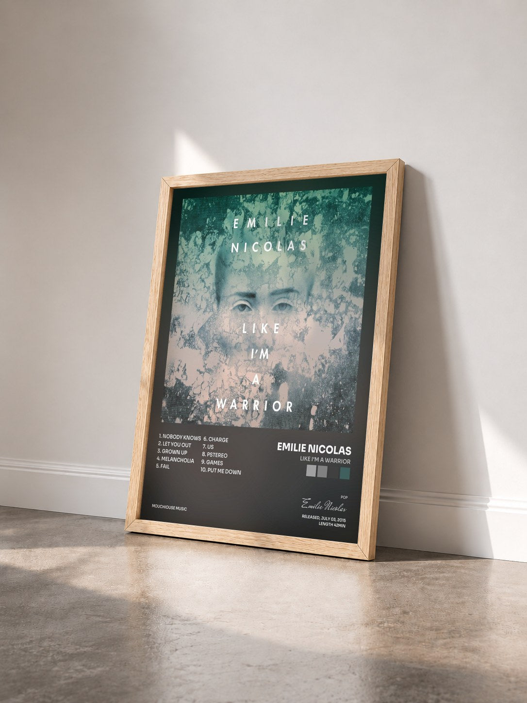 #bois Tableau de l'album Like I'm a Warrior de Emilie Nicolas vu de trois quarts, cadre en bois brut